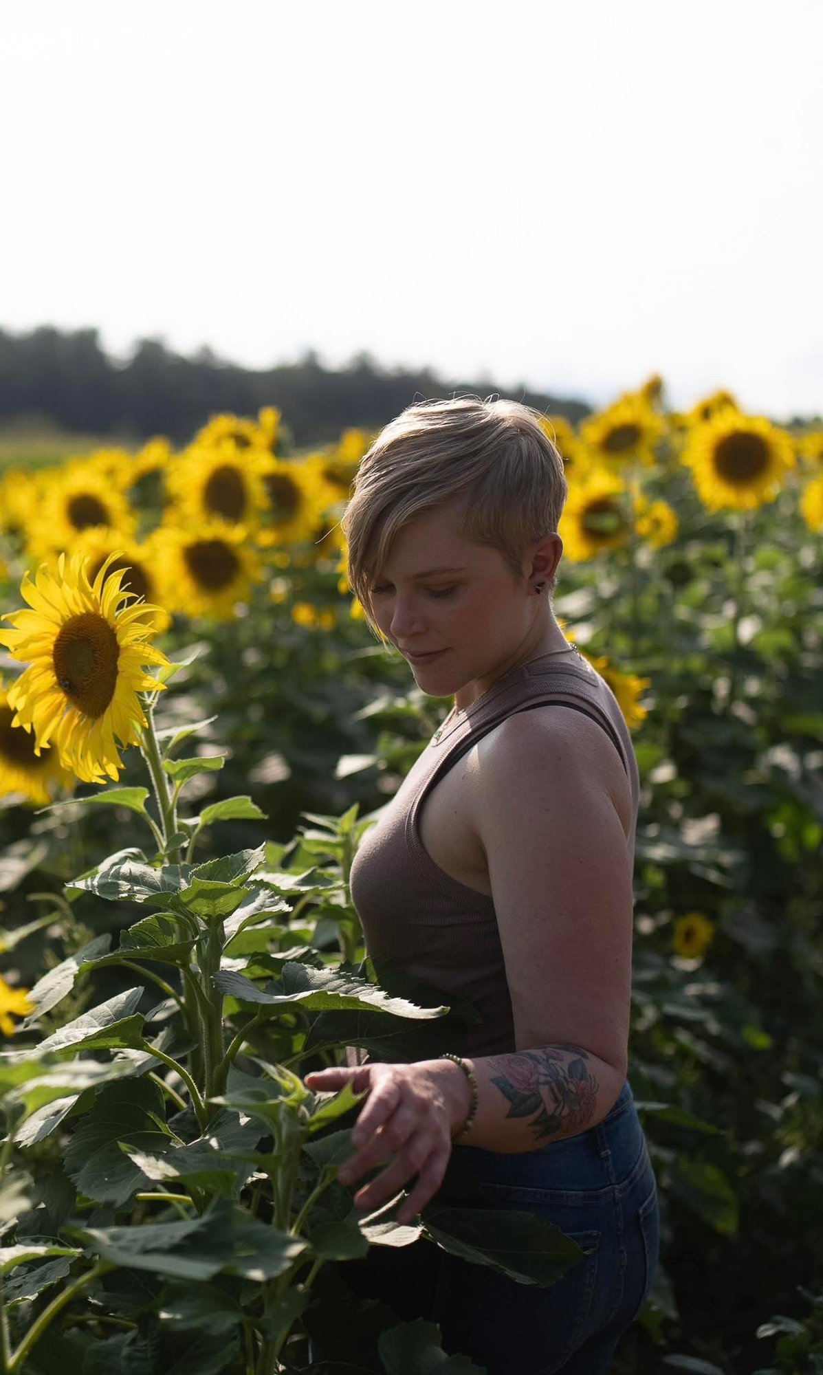 Leigh in a sunflower field